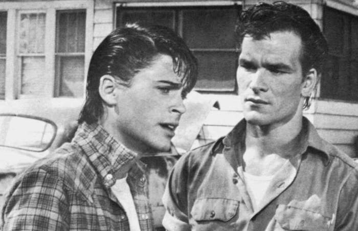 How do ponyboy's relationships with darry and sodapop differ